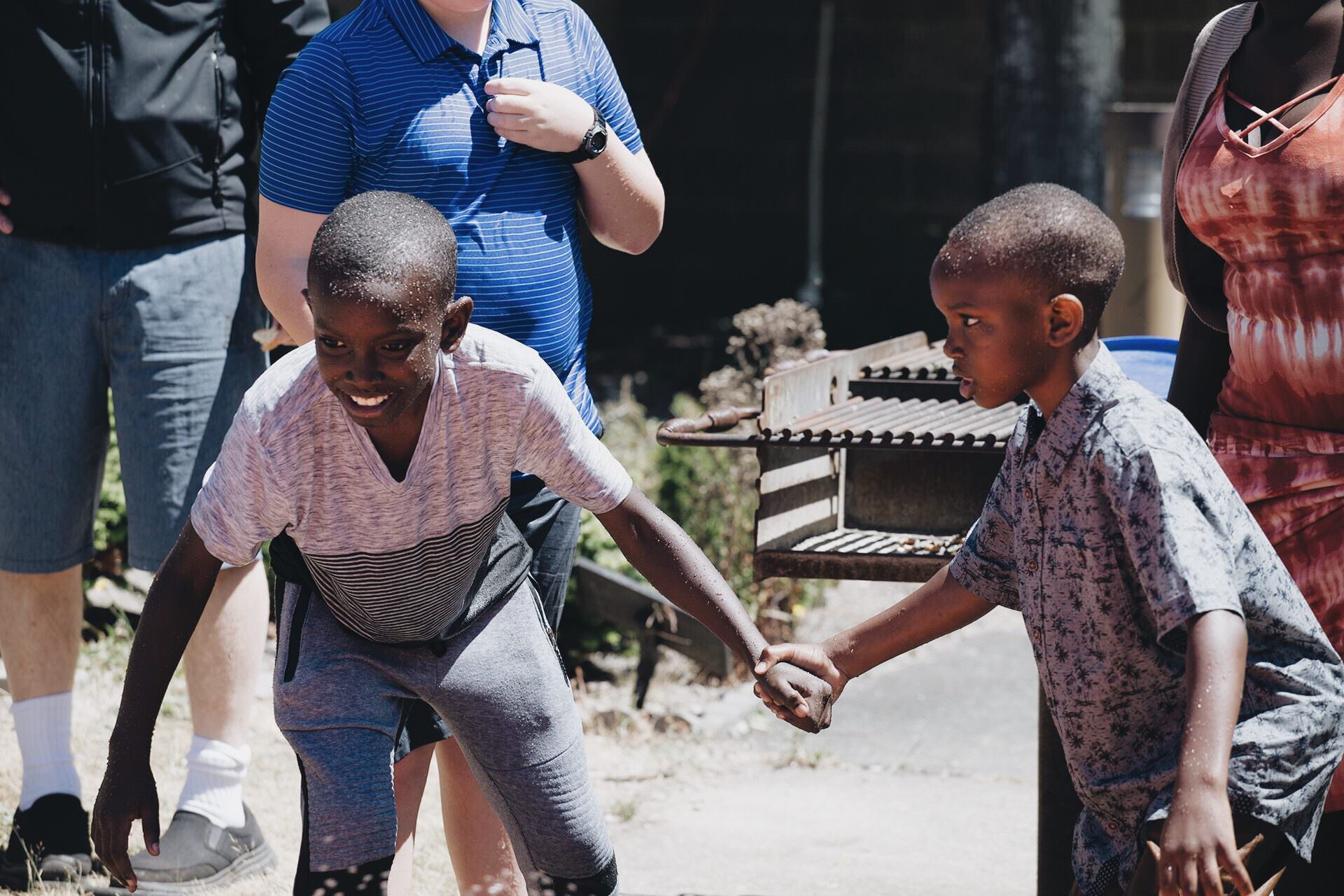 Boys holding hands