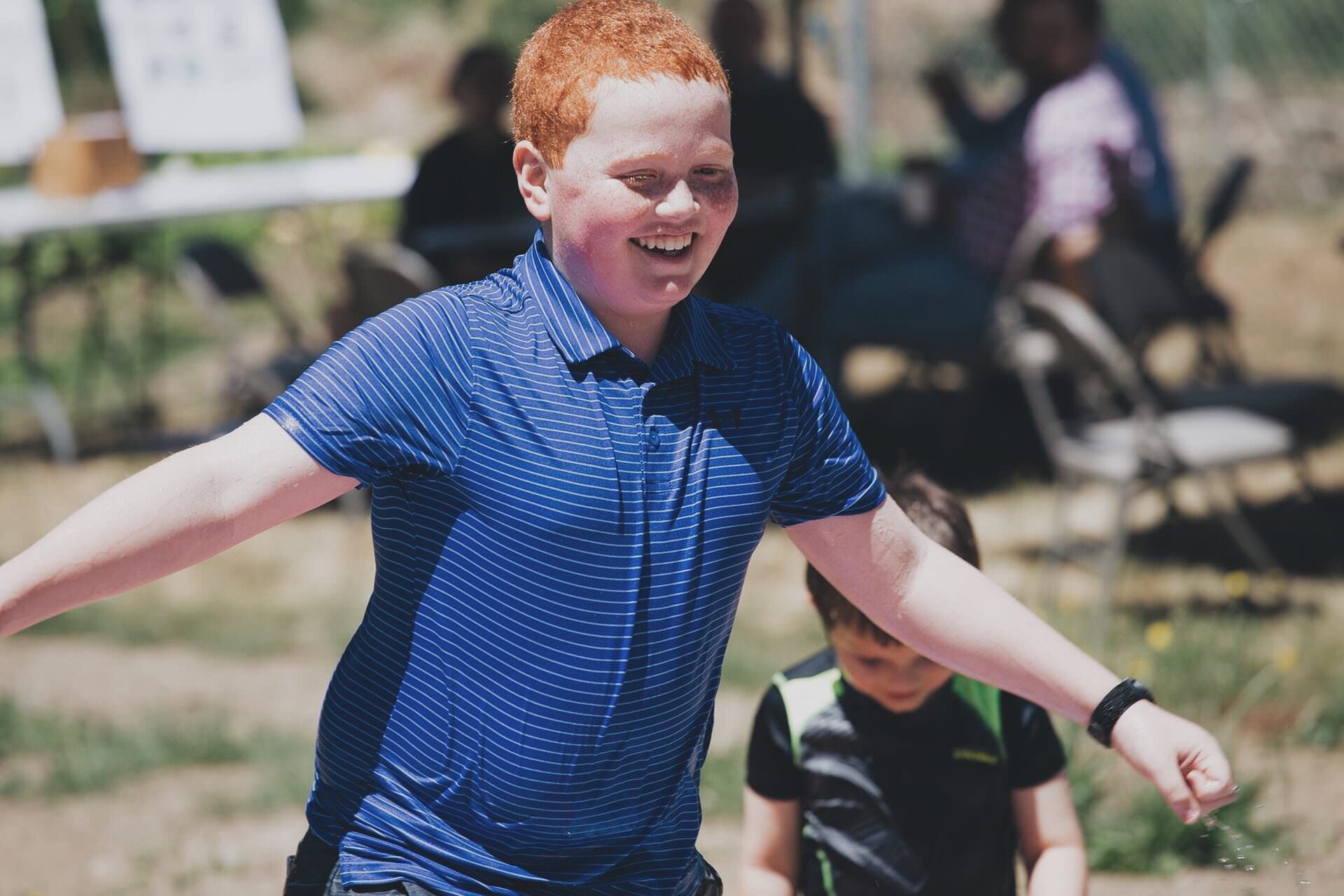 Redhead boy dancing