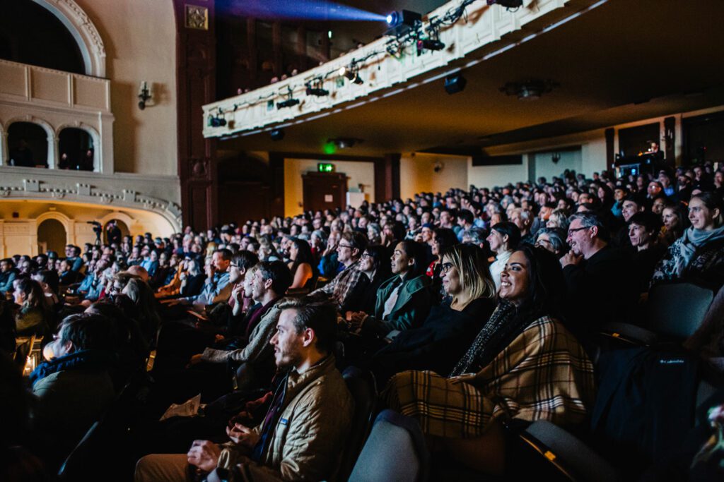 A crowd watches a show