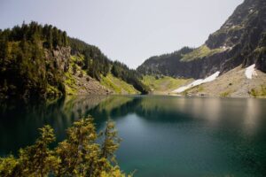 Photograph of Lake Serene with hills in the background reflecting off the water