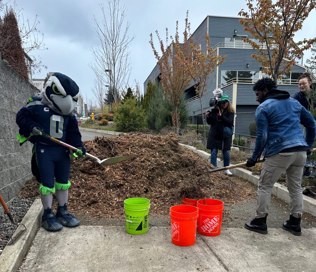 Blitz and a volunteer doing restoration work