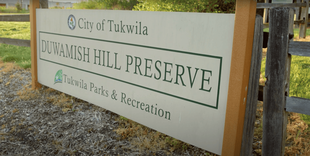 A picture of a sign of Duwamish Hill Preserved.
